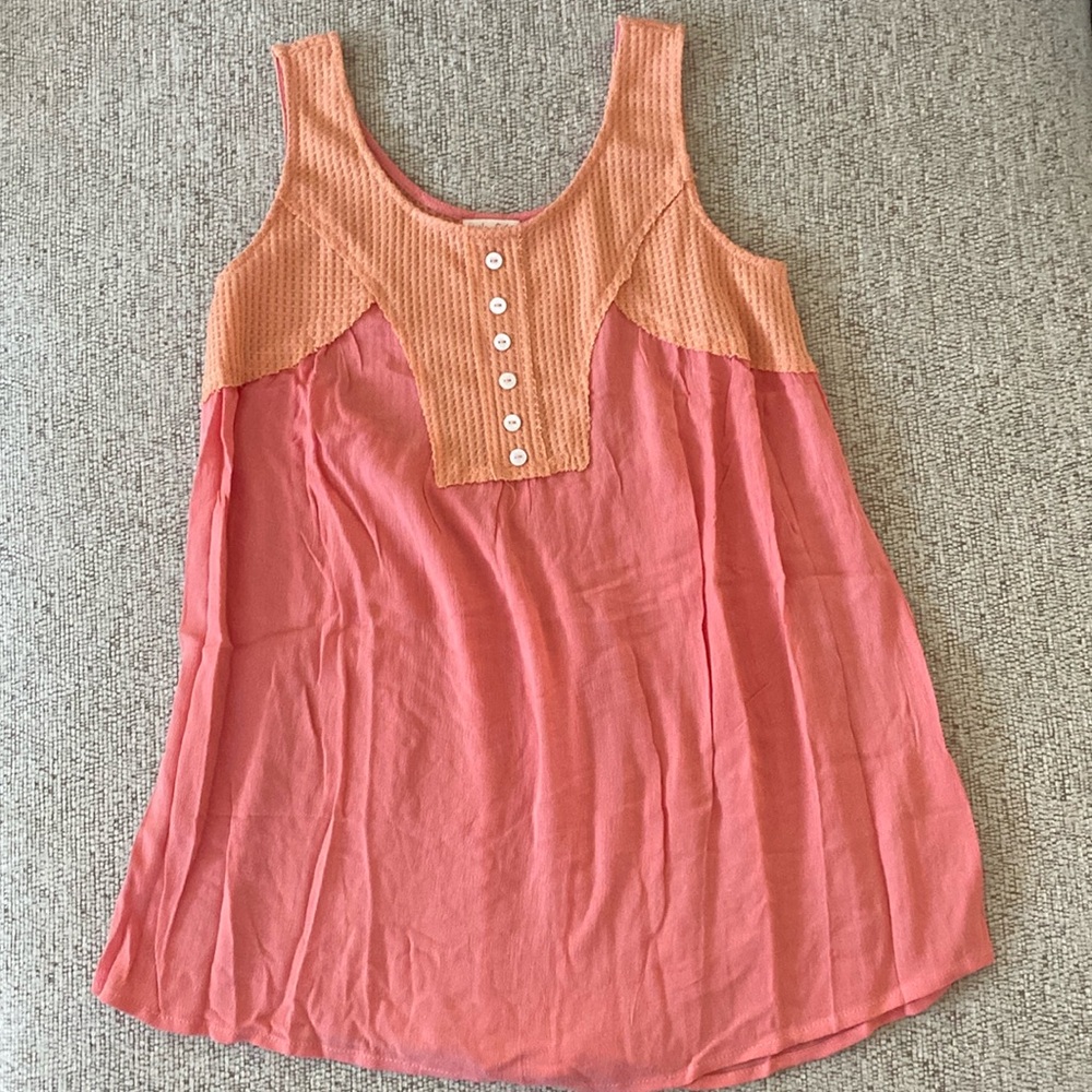 Hailey & Co coral and pink tank top with button detail.